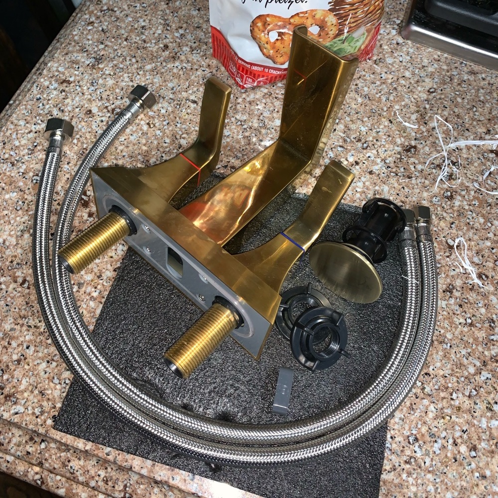 Gold waterfall faucet